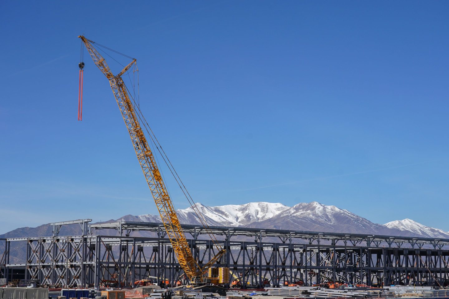 The U.S. construction industry’s need for labor is soaring and will need half a million new workers next year while AI giants ramp up spending