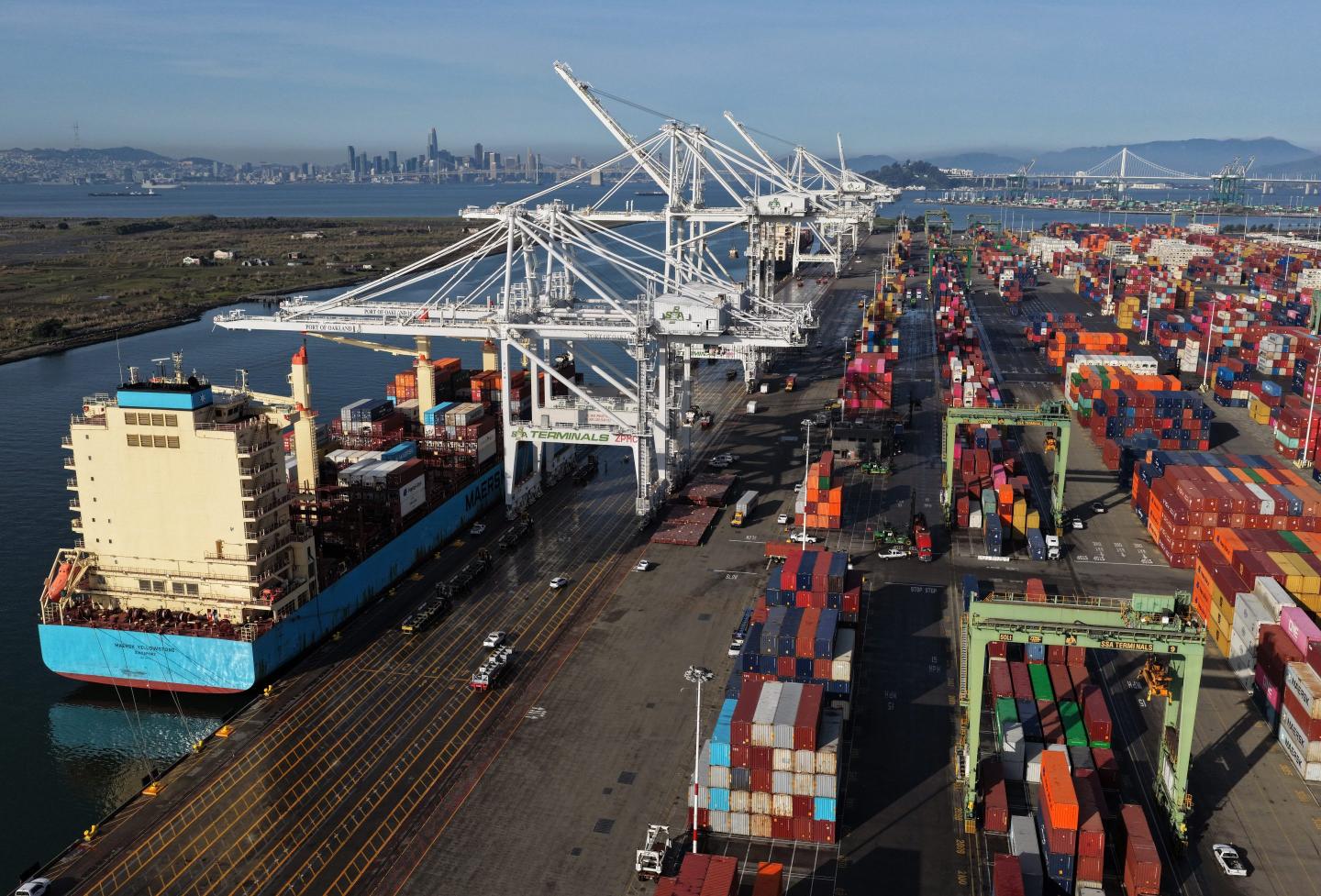 a container ship is seen docked at the Port of Oakland