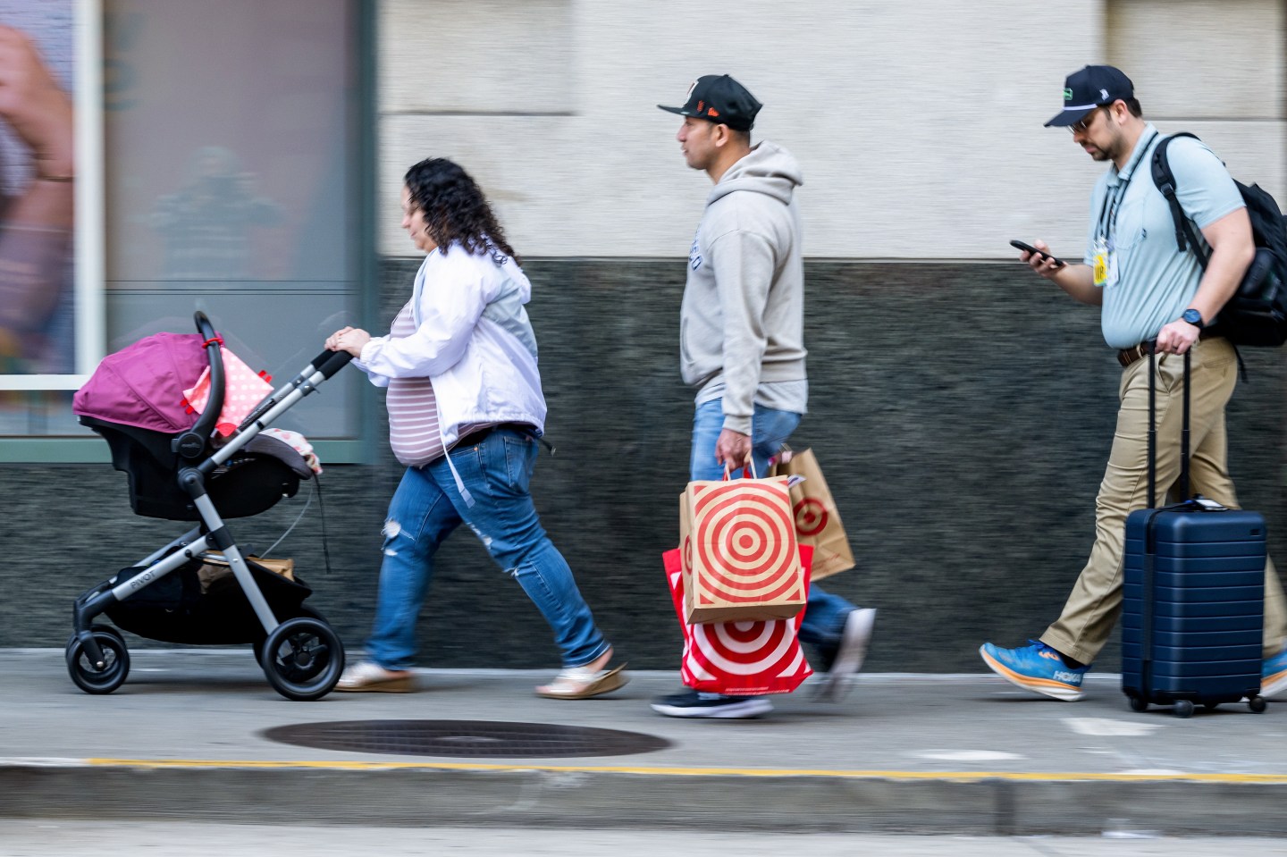 A shopper carries Target bags in San Francisco, California, US, on Thursday, Feb. 5, 2026.