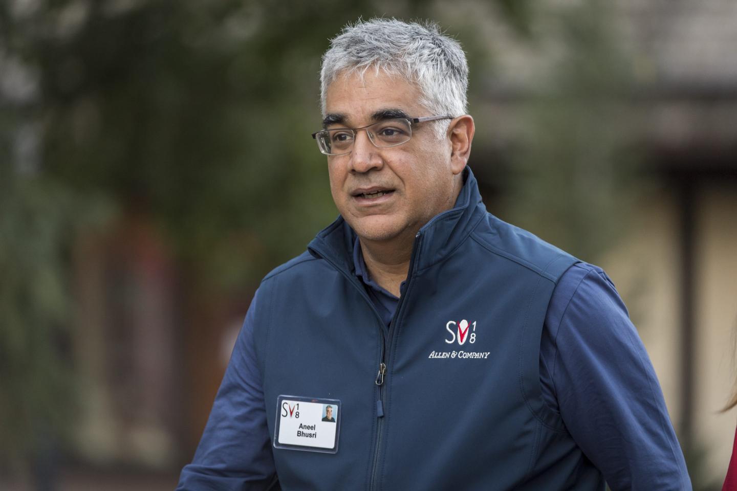Man wearing glasses and a sweatshirt.