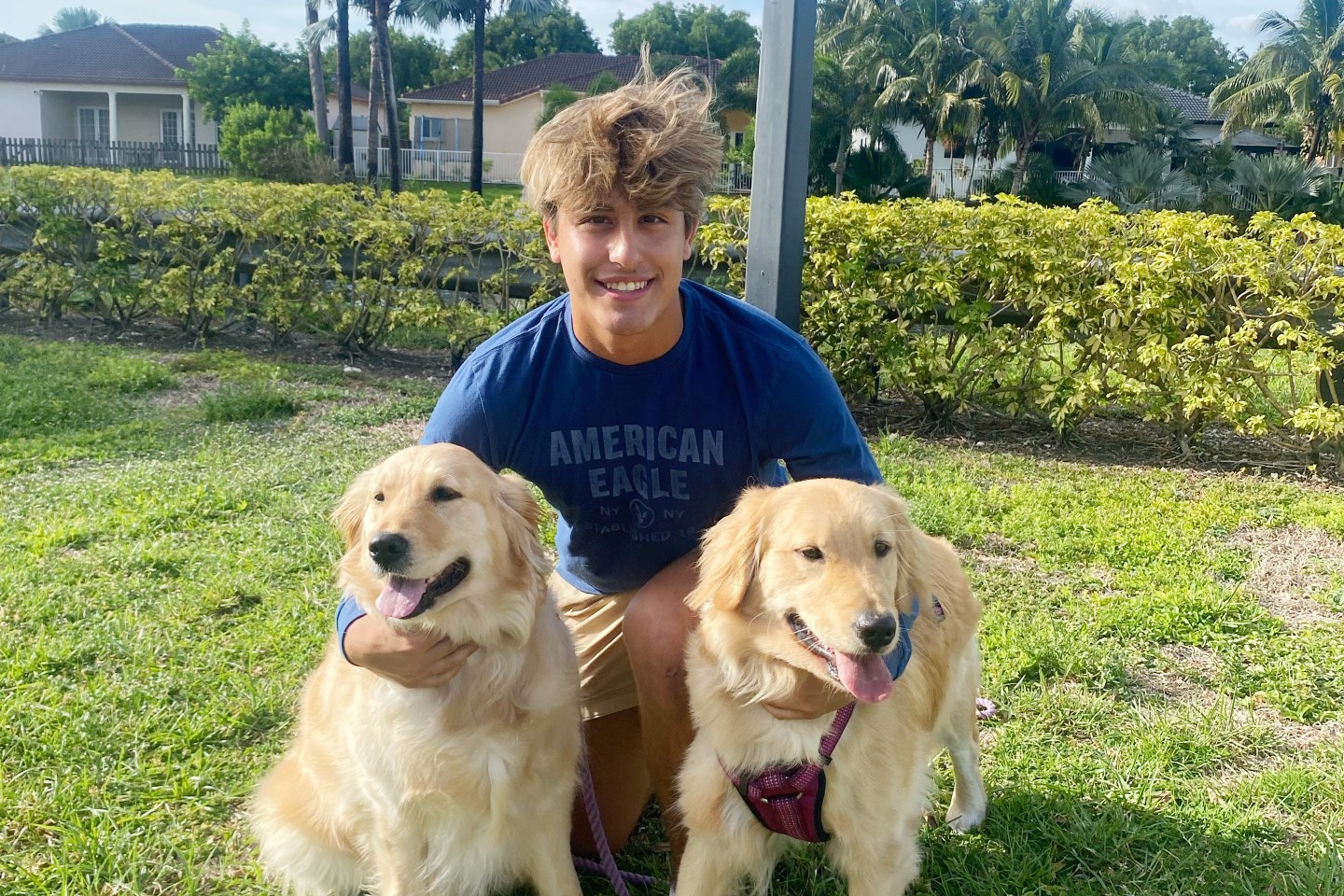 Hector Gutierrez with two dogs