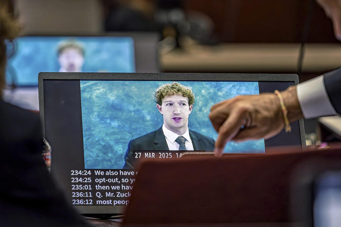 zuckerberg on a screen in court