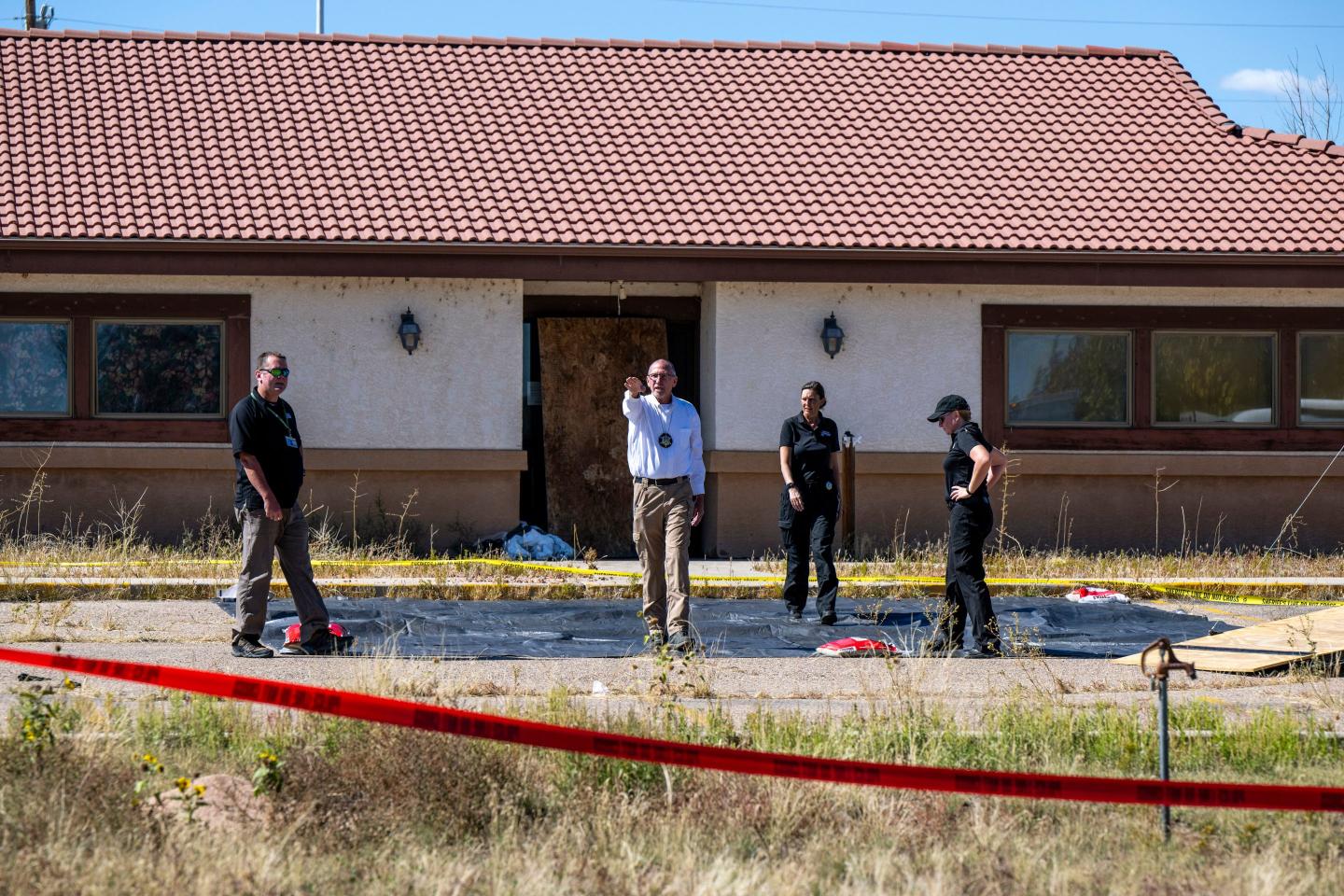 Police tape outside of a funeral parlor