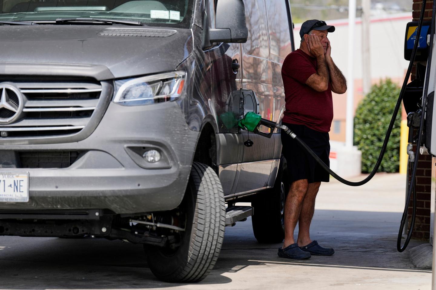 Ray Ruda fills his van with fuel at a gas station Wednesday, March 25, 2026, in Brentwood, Tenn. 