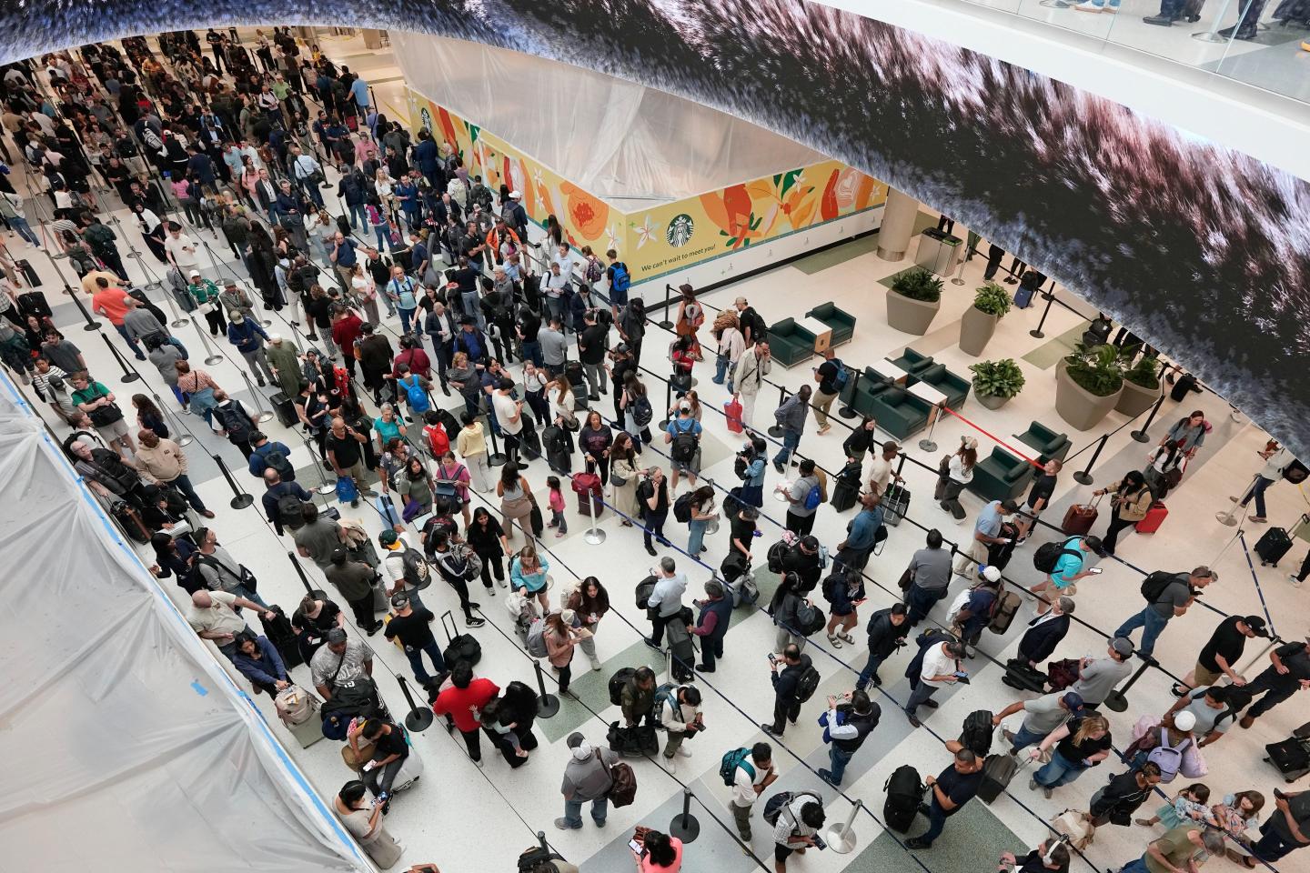 ICE agents called in to help ease airport security lines may not be leaving anytime soon, even after Trump ordered pay for TSA officers