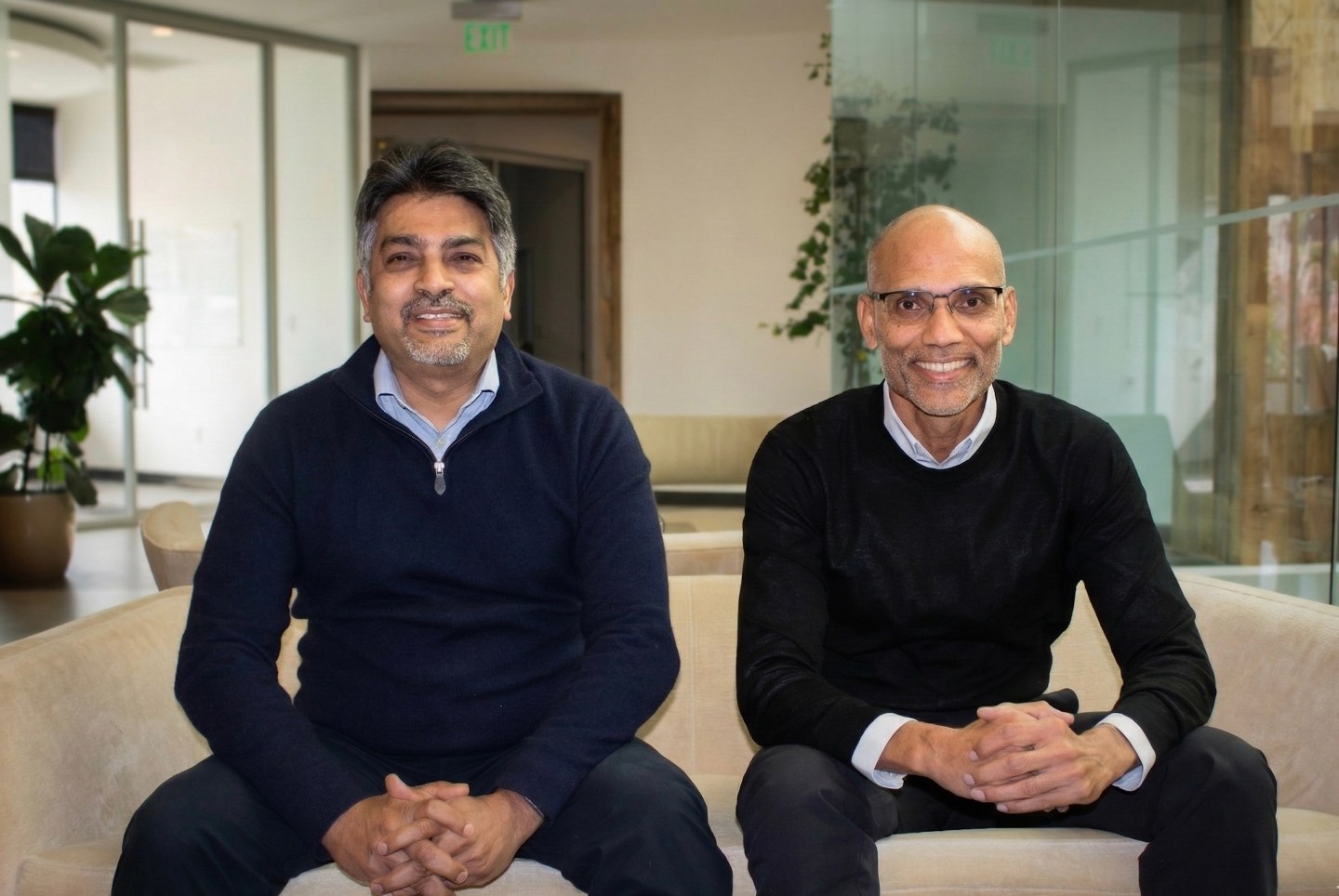 Rajiv Gupta (right) and Kaushik Narayan (left) smile