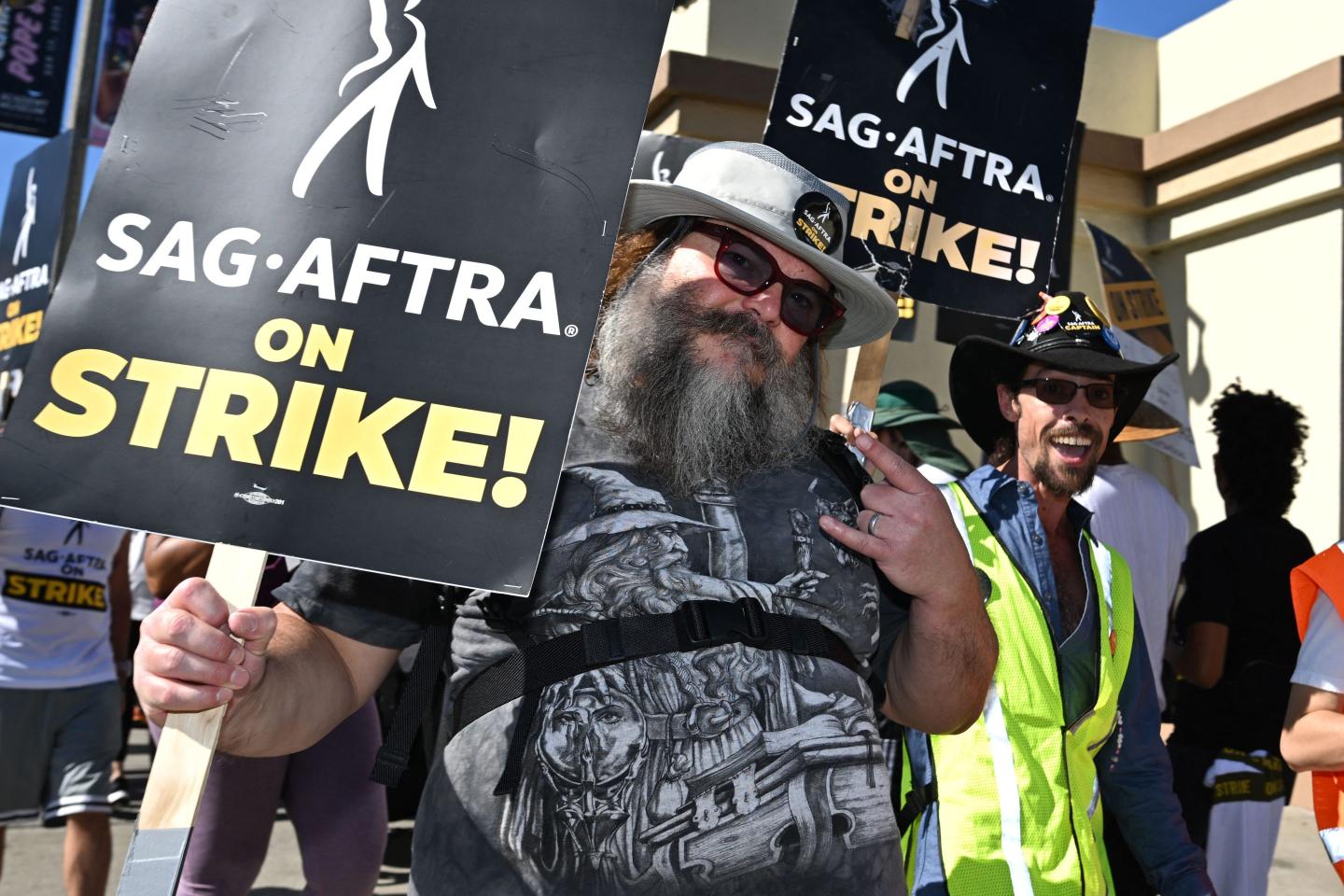 Actor Jack Black joins SAG-AFTRA members and their supporters as they walk a picket line outside Paramount Studios during their strike against the Hollywood studios, in Los Angeles, California, on November 8, 2023.