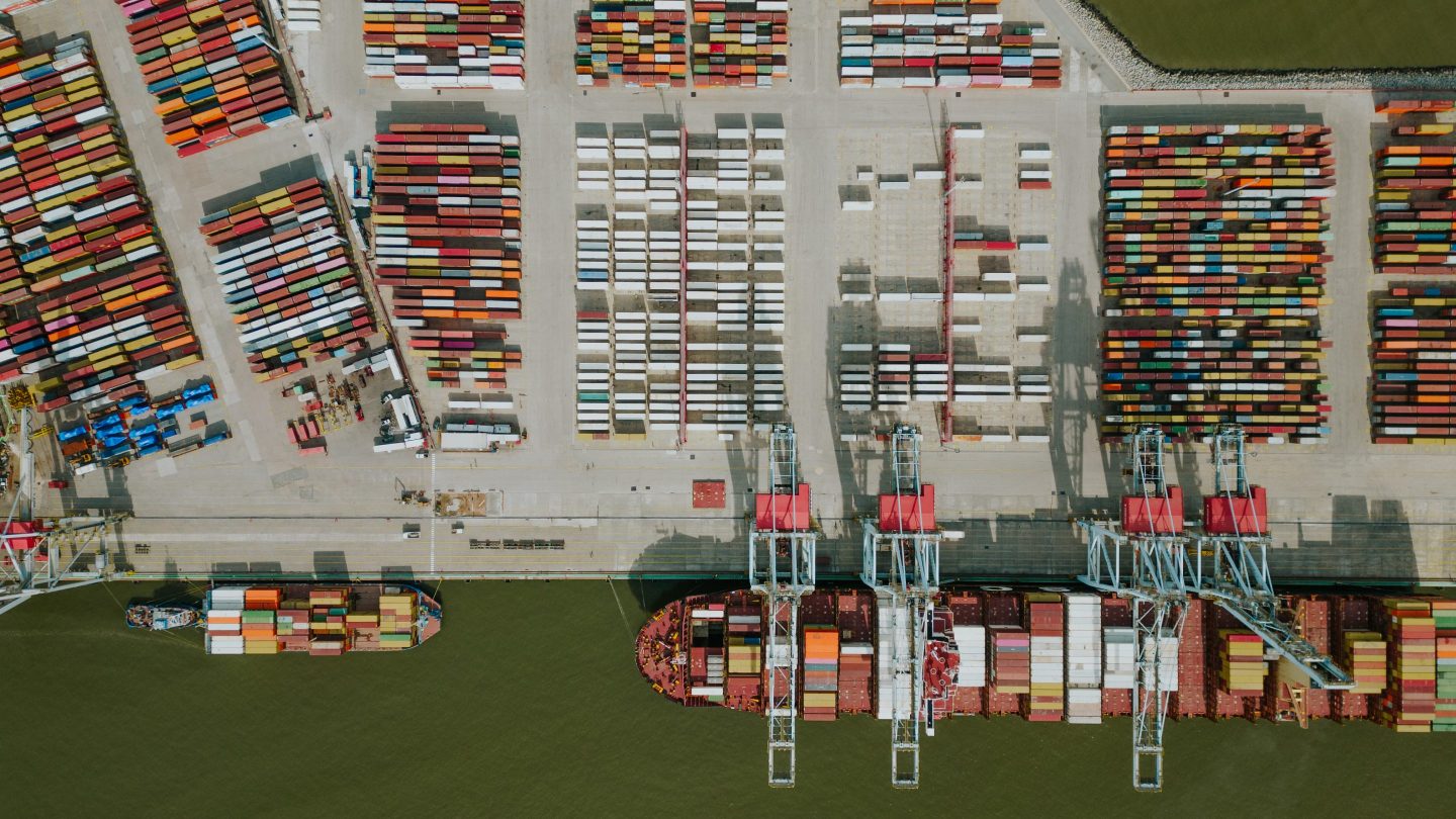 aerial shot of a port with cargo containers