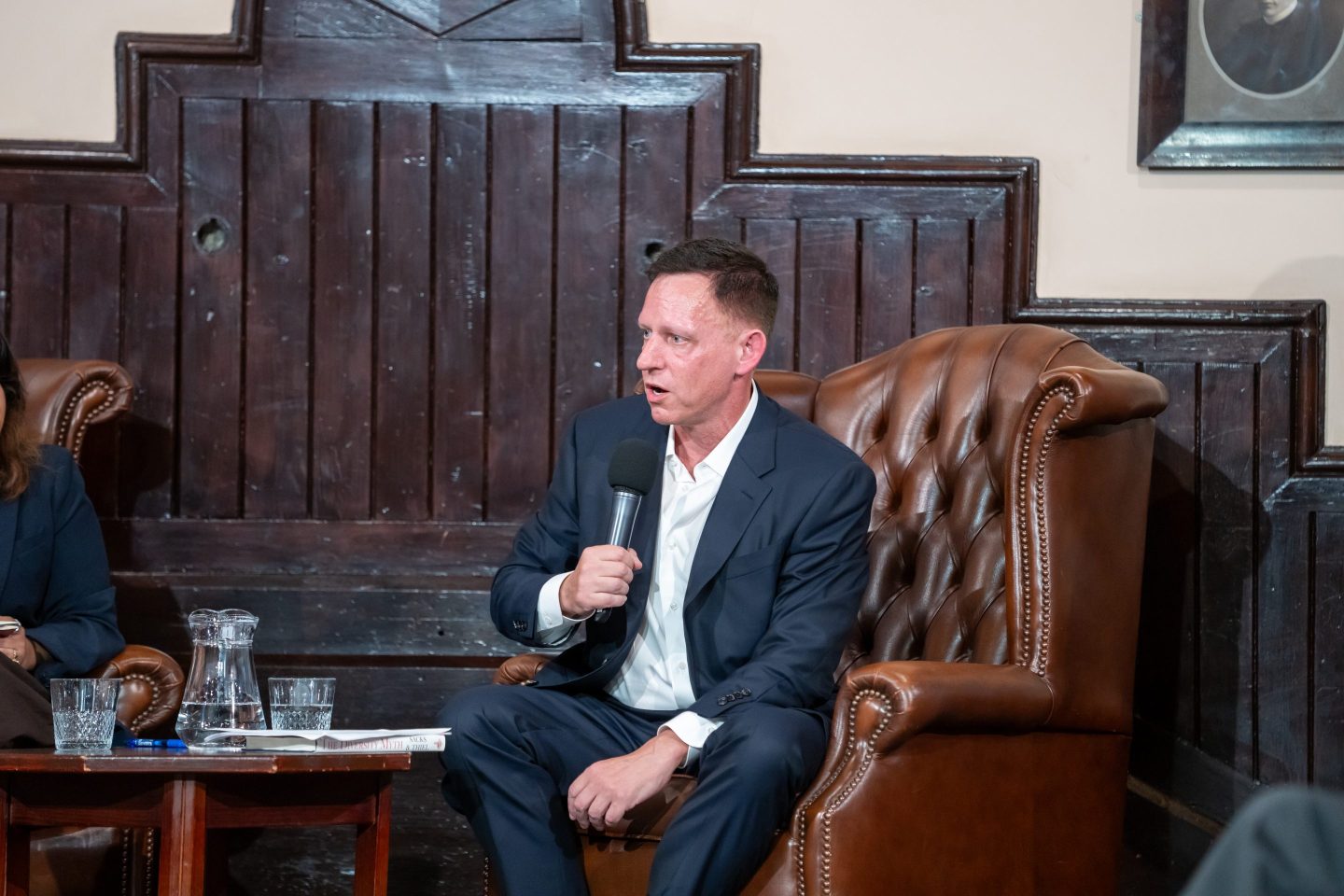 Peter Thiel warned AI is coming for ‘math people before word people.’ Banks have already said smaller headcounts are possible