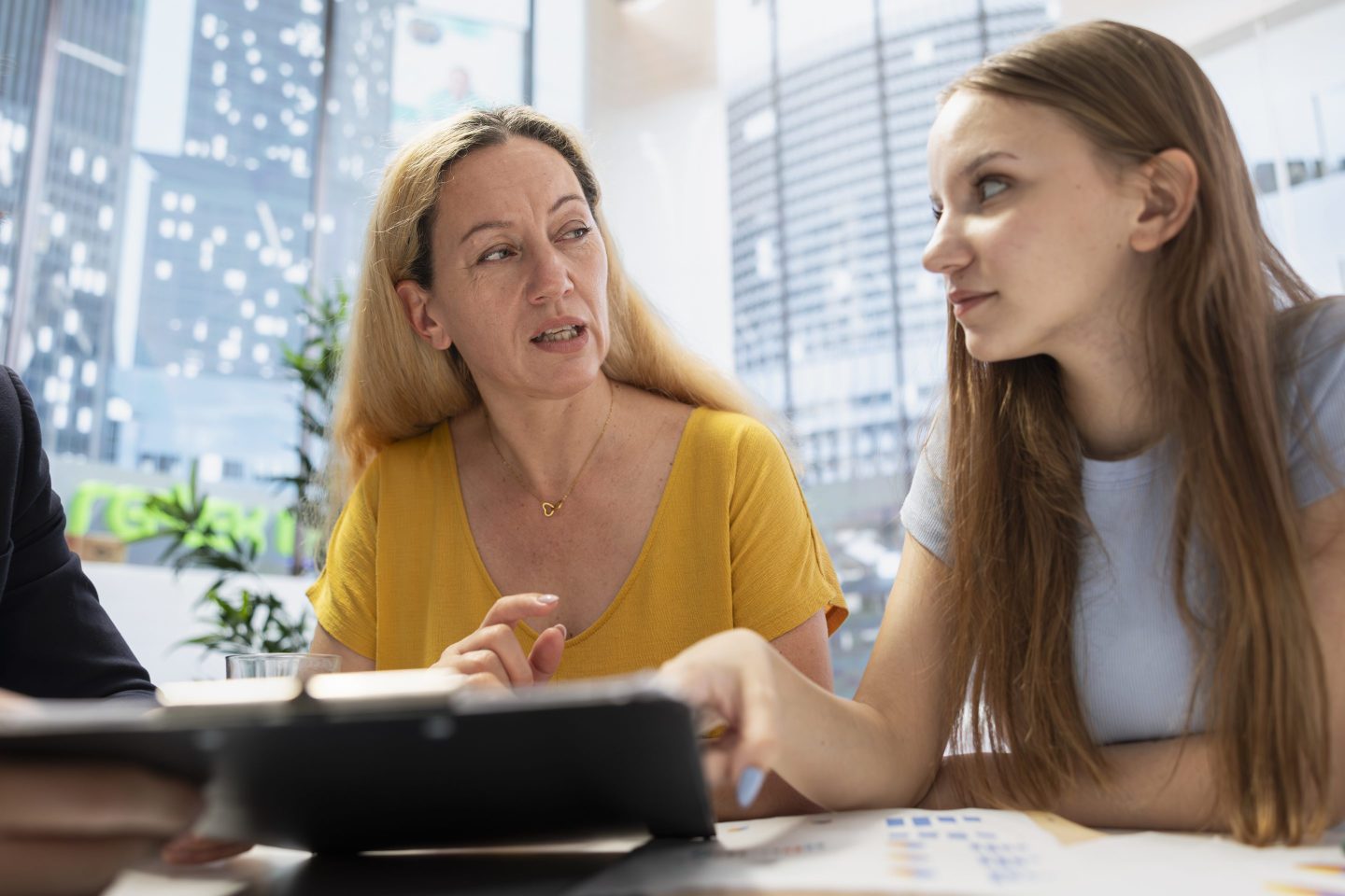 Parent with Gen Z adult kid talking about money