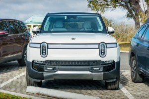 Uber will operate its own robotaxis again—this time with Rivian’s not‑yet‑built EVs