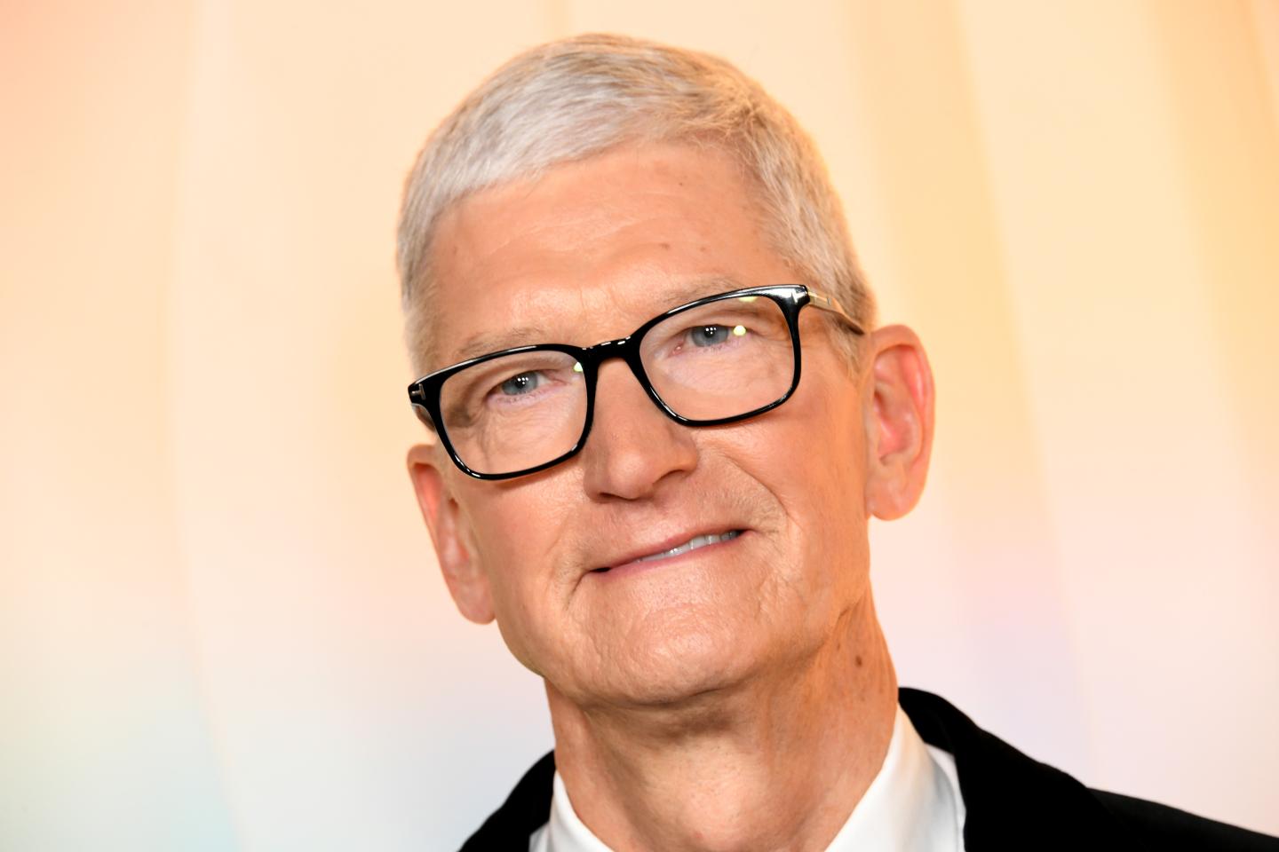 Man with gray hair and glasses