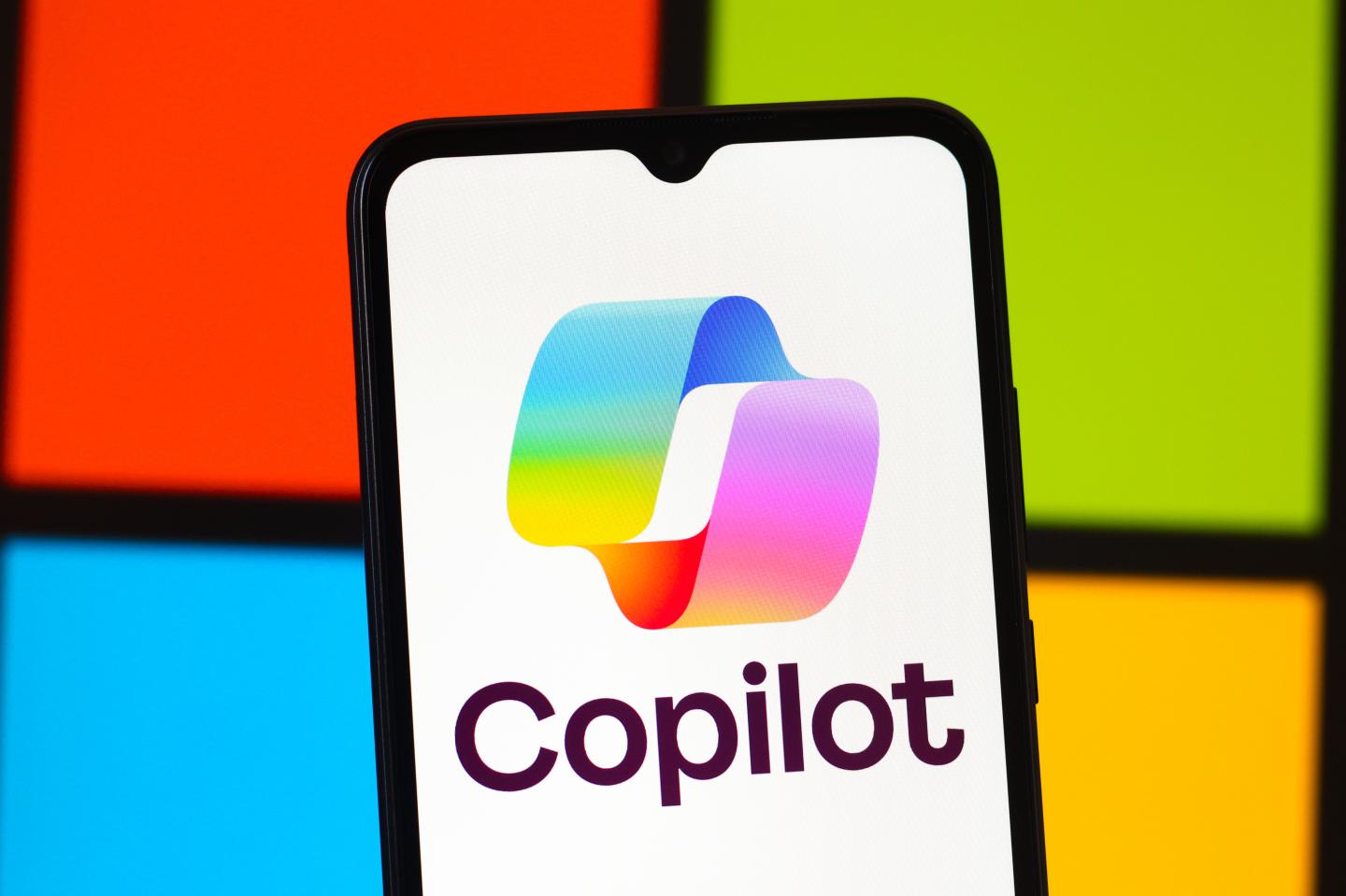In this photo illustration, the Microsoft Copilot AI logo is seen displayed on a smartphone screen.
