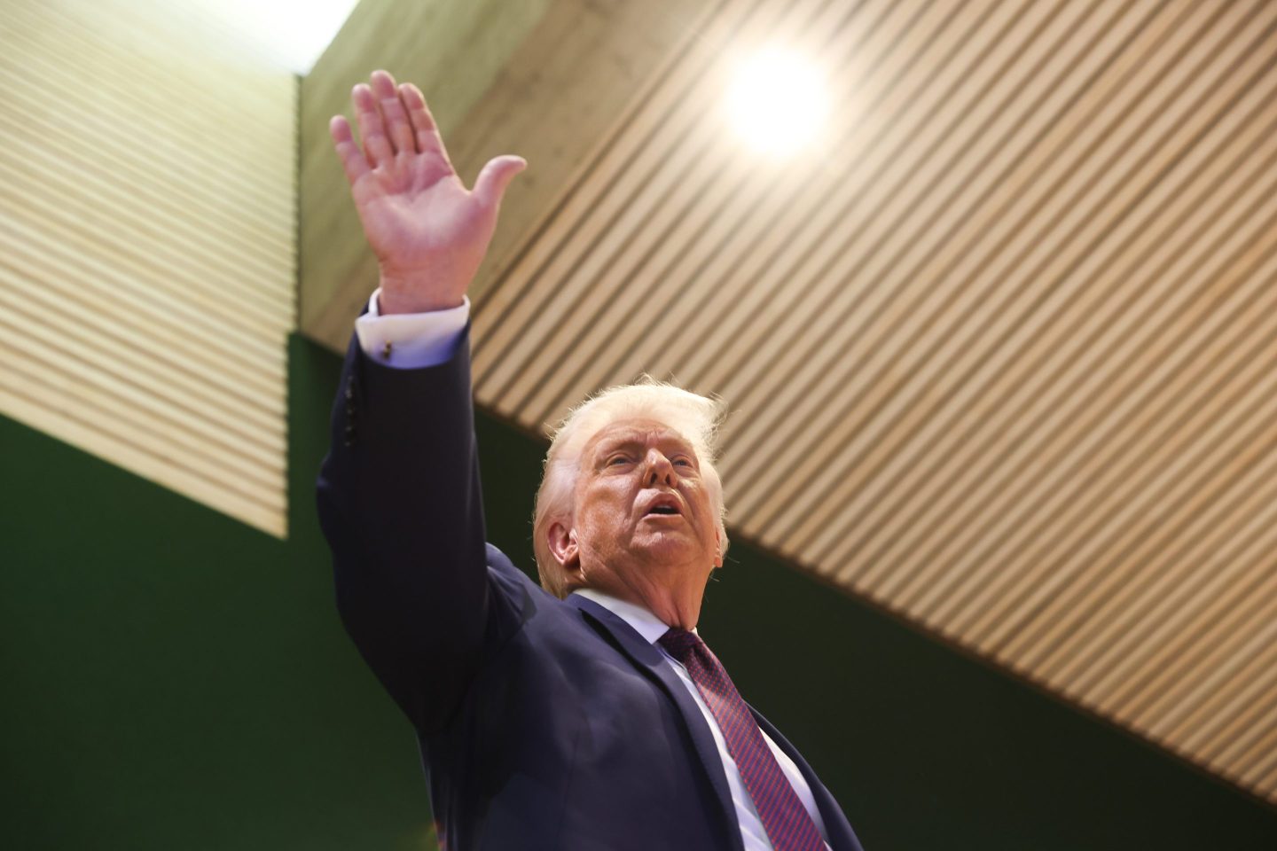 Trump holding his hand