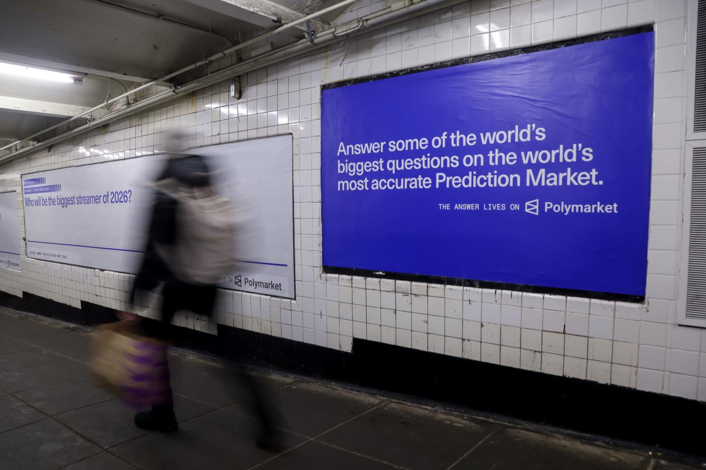 an ad for polymarket in a subway station