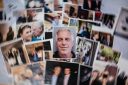 This photograph taken in Le-Perreux-sur-Marne, outside Paris on February 9, 2026 shows undated pictures provided by the US Department of Justice on January 30, 2026 as part of the Jeffrey Epstein files