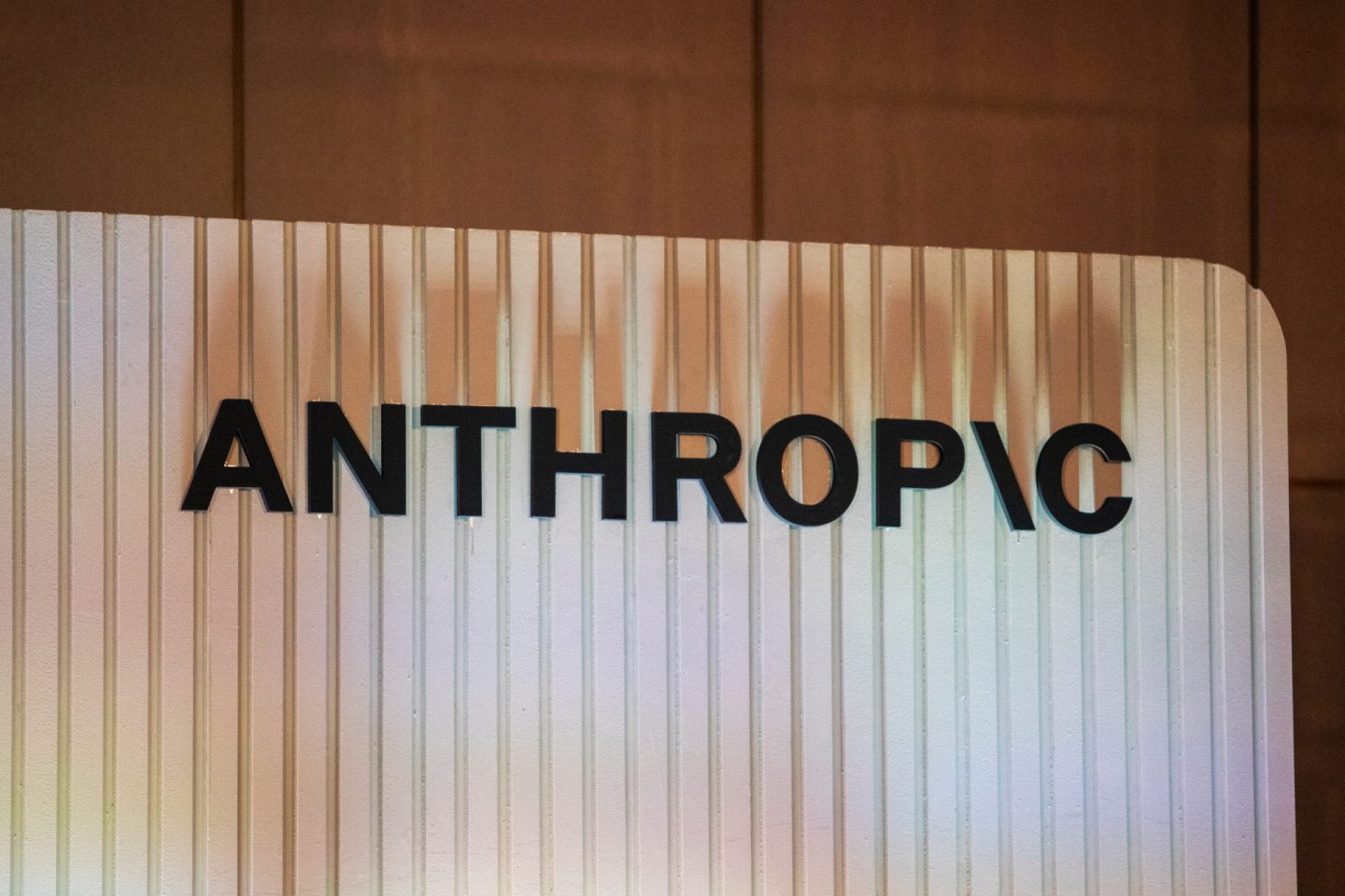 Anthropic's logo on a wall.