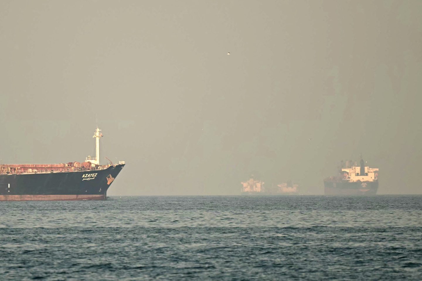 Oil prices soar 10% as tanker traffic halts near the Strait of Hormuz amid Iran attacks while IRGC warns against passage. ‘Our ships will stay put’