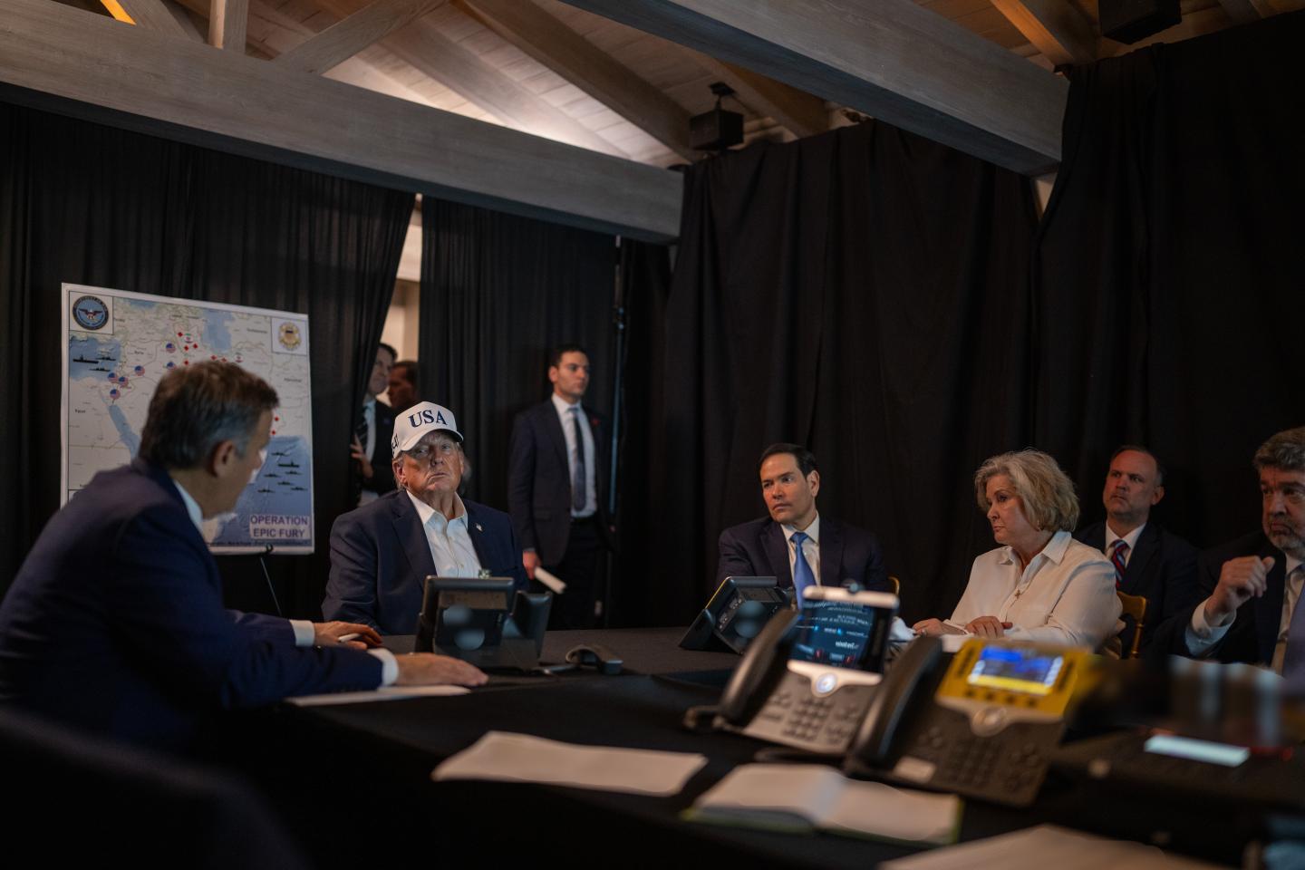 President Donald Trump (C) oversees "Operation Epic Fury"