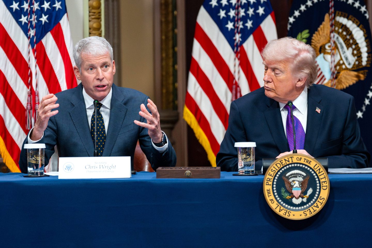 Chris Wright, US energy secretary sitting next to US President Donald Trump