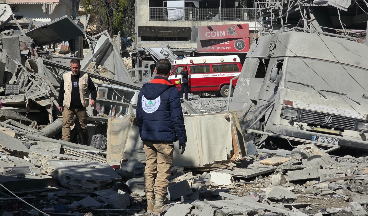 Photo: Volunteers stand amid the debris of destroyed buildings at the site of an Israeli airstrike in the southern Lebanese city of Nabatieh on March 5, 2026. Israel launched on March 5 a fresh wave of strikes on Iran, which stepped up its attacks on Gulf nations Qatar and Bahrain, as the Middle East war spread throughout the region and beyond. (Photo by Mouhammad al-ZANATY / AFP)