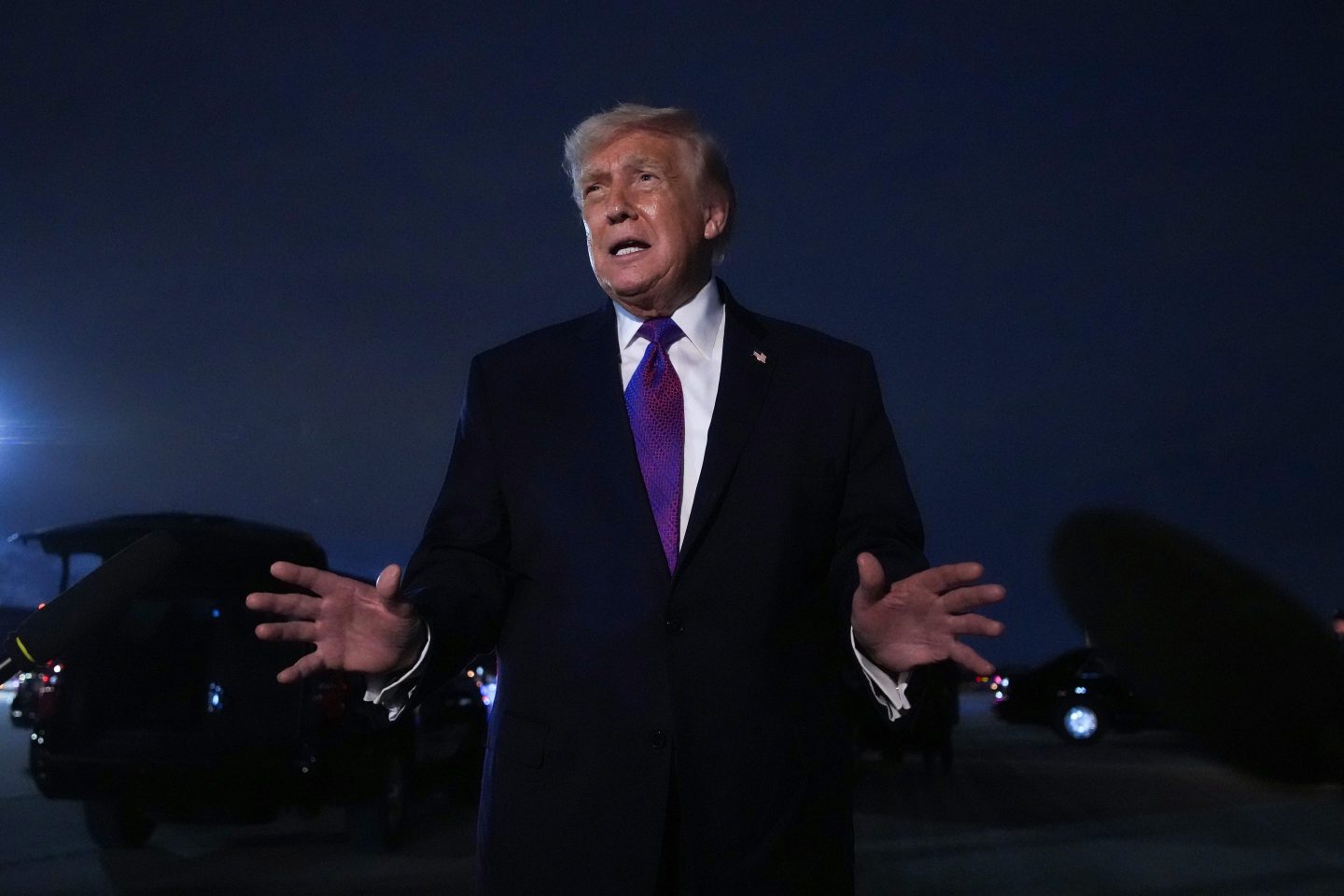 U.S. President Donald Trump speaks to the press after landing on Air Force One on March 11, 2026 at Joint Base Andrews, Maryland.