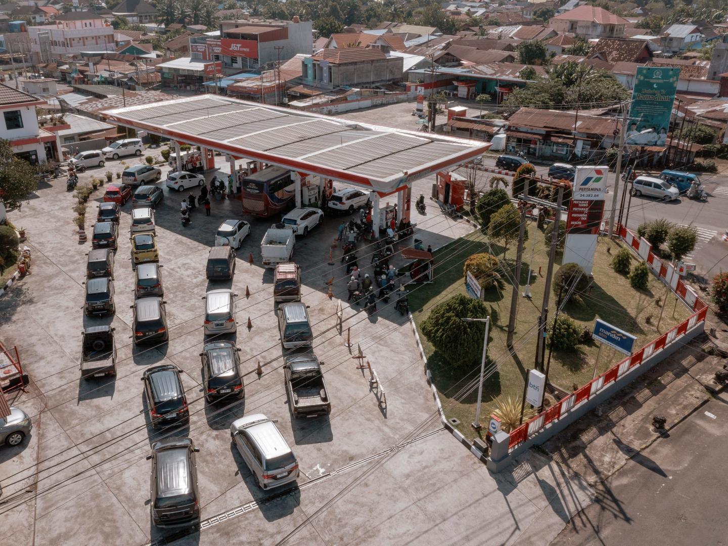 Vehicles queue up at a gas station in Bengkulu, Indonesia, in March. Rising oil prices, aggravated by war in Iran, have put new fiscal pressure on Indonesia’s government.