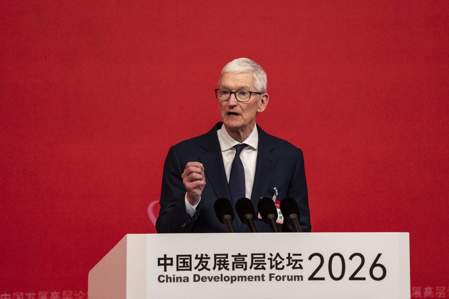 Tim Cook, chief executive officer of Apple Inc., speaks at the China Development Forum in Beijing, China, on Sunday, March 22, 2026. The forum runs through March 23. Photographer: Qilai Shen/Bloomberg via Getty Images