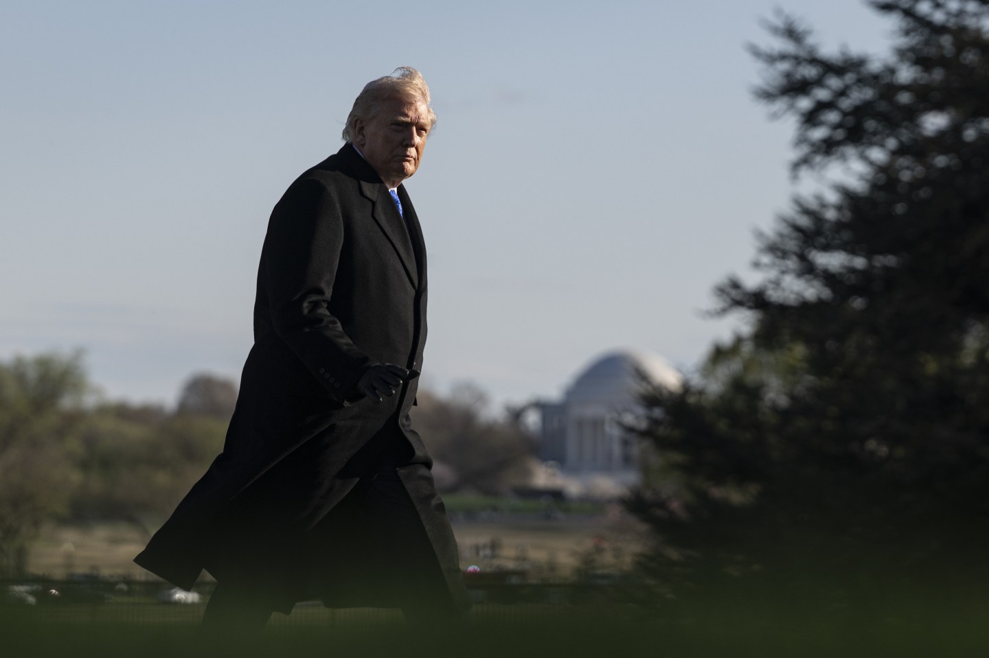 United States President Donald Trump walks toward the White House upon his arrival in Washington, DC, from Memphis, Tennessee, United States, on March 23, 2026.