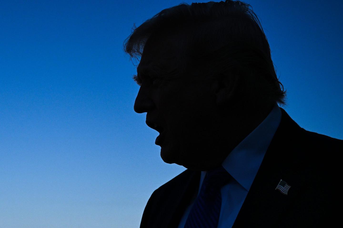 U.S. President Donald Trump speaks to reporters before boarding Air Force One at Palm Beach International Airport on March 23, 2026 in West Palm Beach, Florida.
