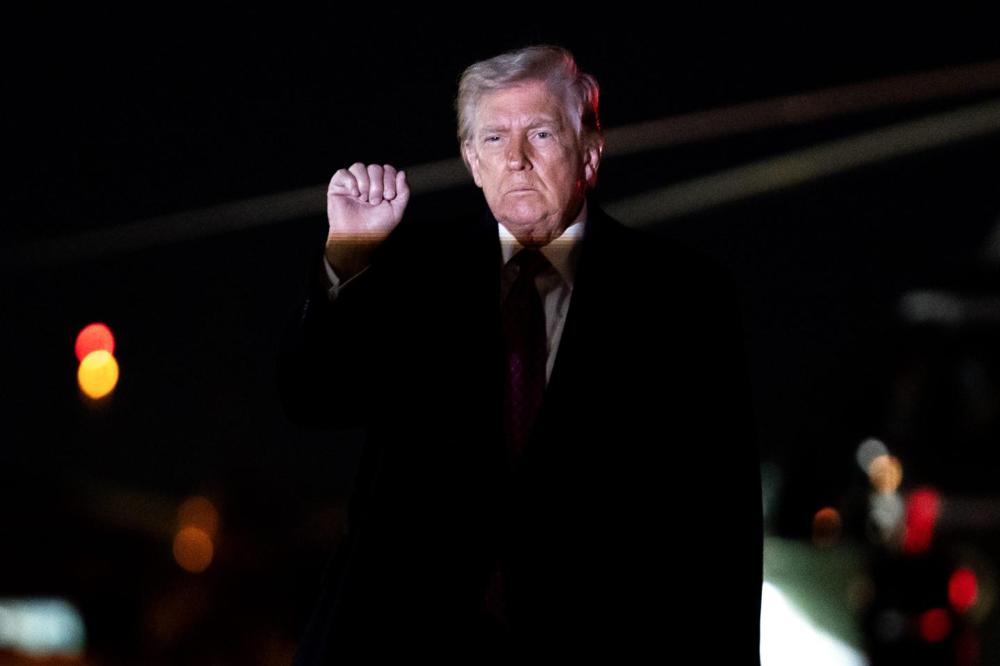 President Donald Trump exits Air Force One on March 29, 2026, at Joint Base Andrews, Md. 