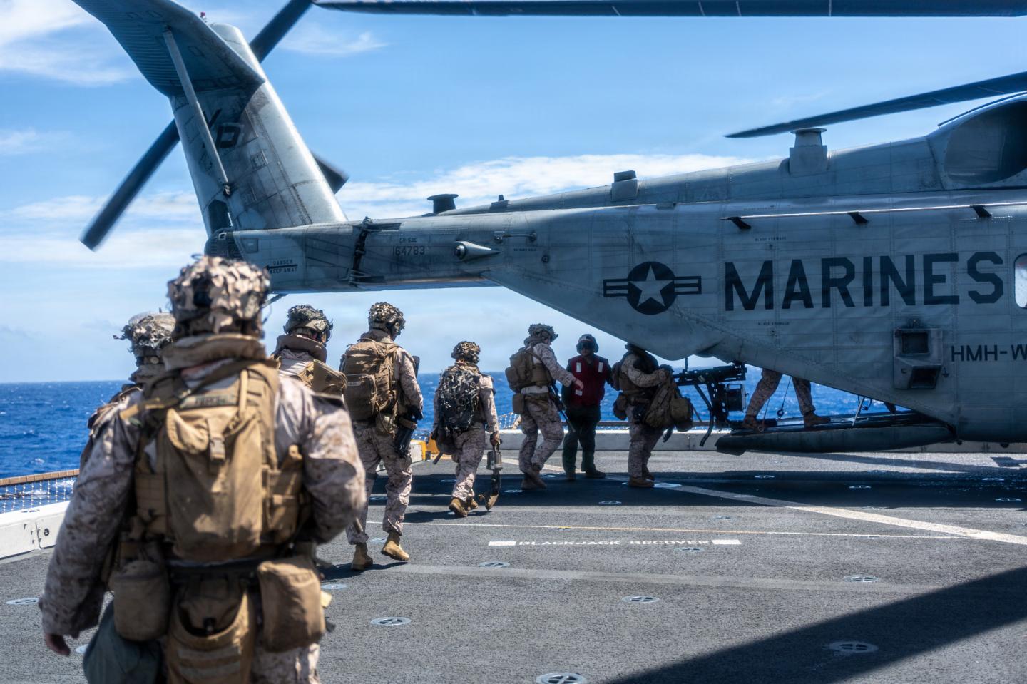Marines during a drill aboard the USS Portland in the Pacific Ocean, April 14, 2026.