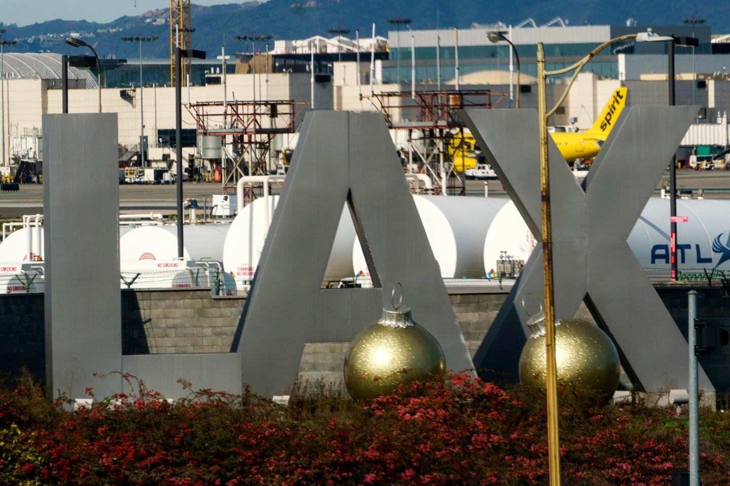 Feds arrest a Los Angeles woman at LAX on suspicion of helping Iran traffic weapons to Sudan
