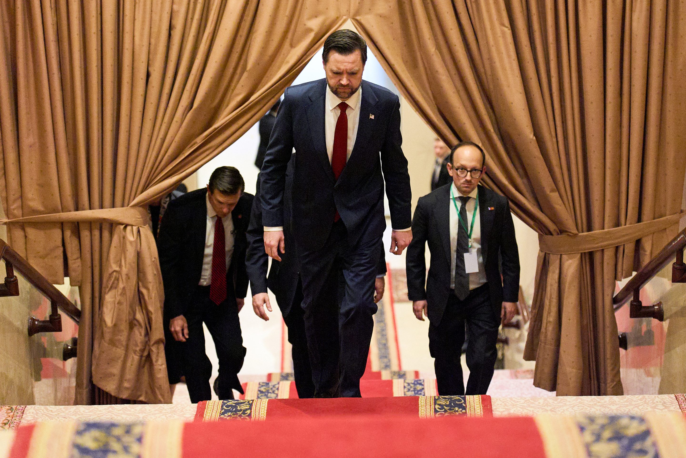 Vice President JD Vance, center, walks up a flight of stairs to meet with Pakistan's Prime Minister Shehbaz Sharif for talks about Iran, Saturday, April 11, 2026, in Islamabad.