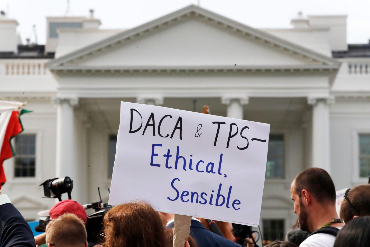 daca and tps protest sign