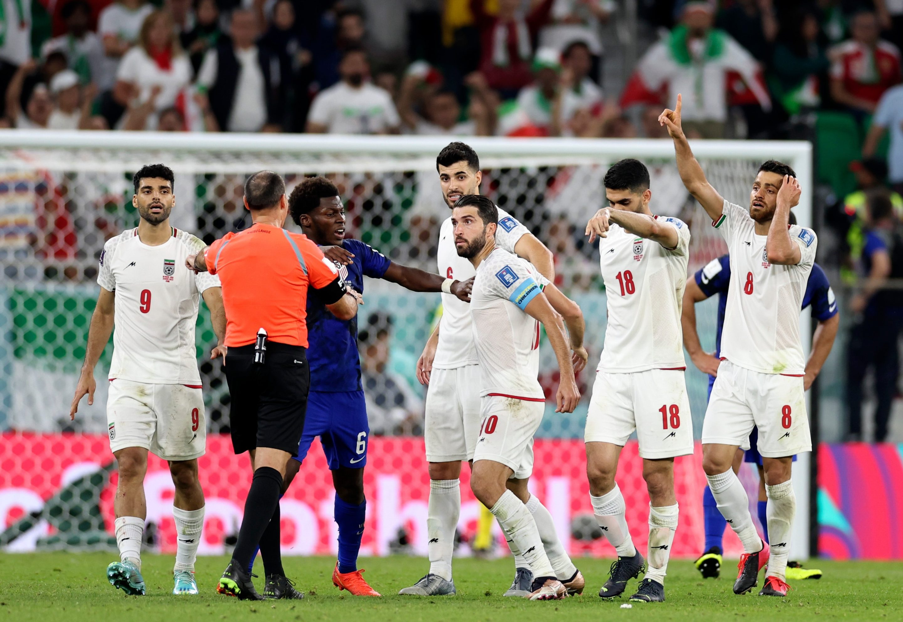 Karim AnsarifardC of Iran argues with referee Antonio Mateu Lahoz during the Group B match between Iran and the United States at the 2022 FIFA World Cup at Al Thumama Stadium in Doha, Qatar, Nov. 29, 2022. 