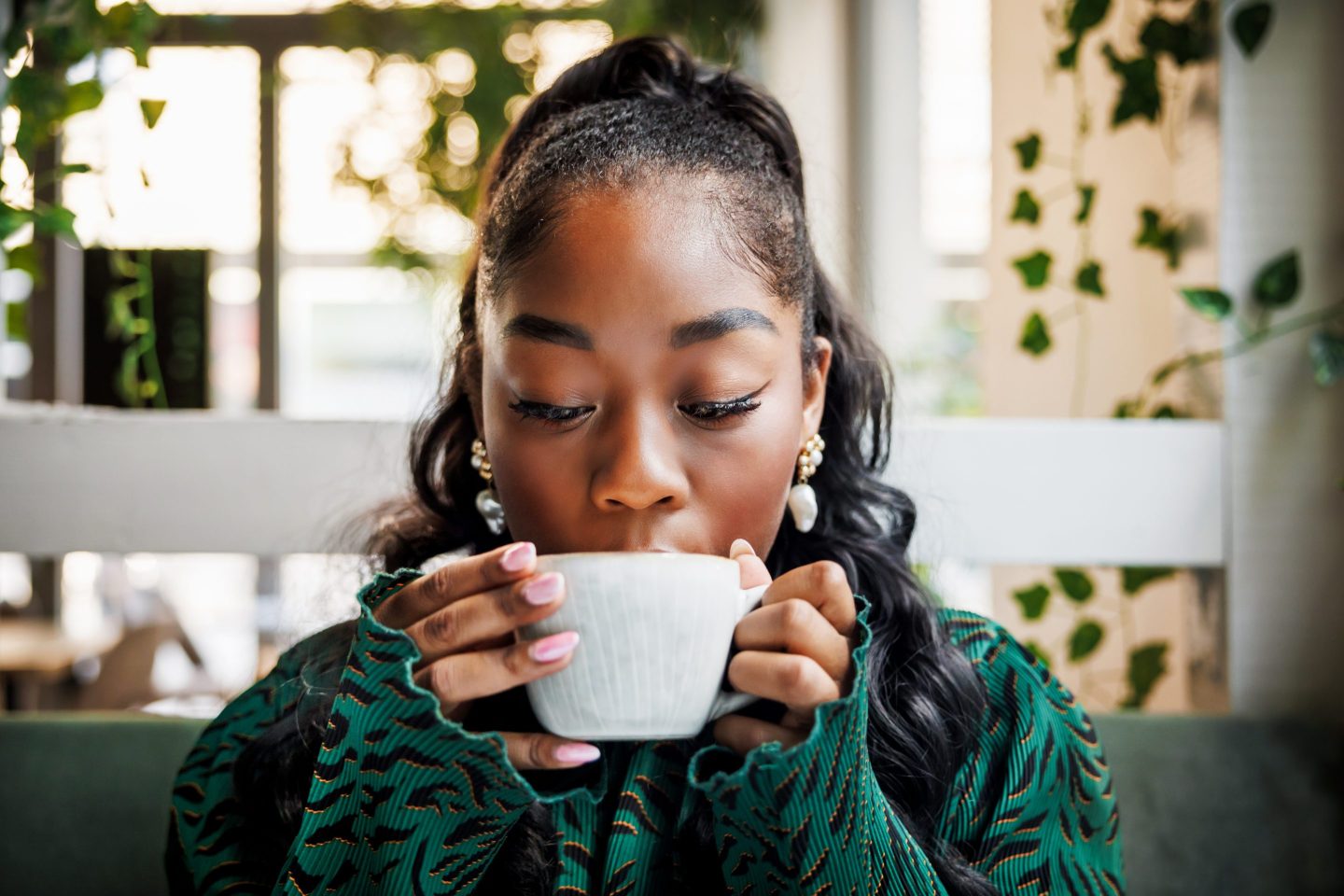 Woman drinking coffee
