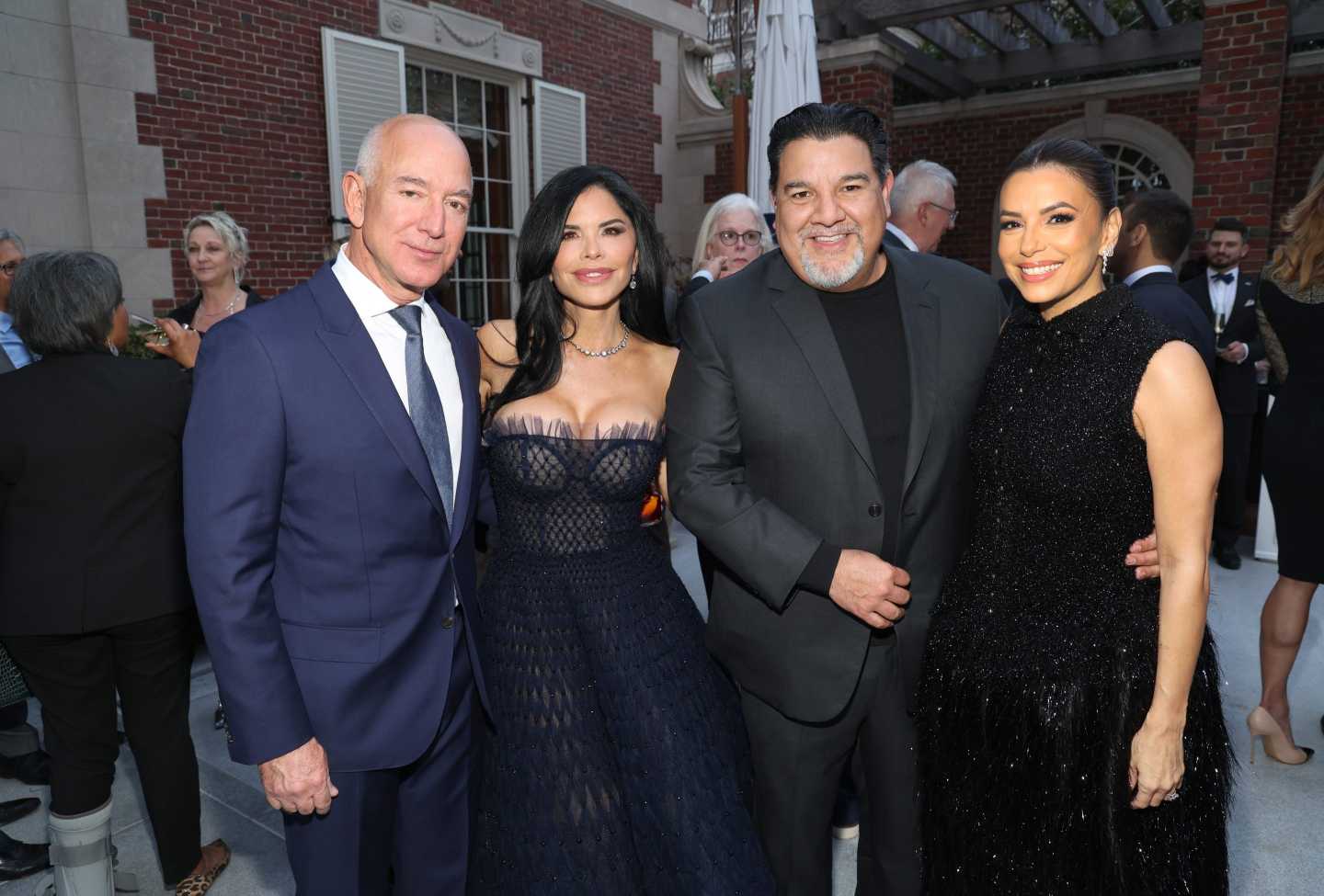 Photo of (left to right) Jeff Bezos, Lauren Sánchez, Cris Abrego, and Eva Longoria
