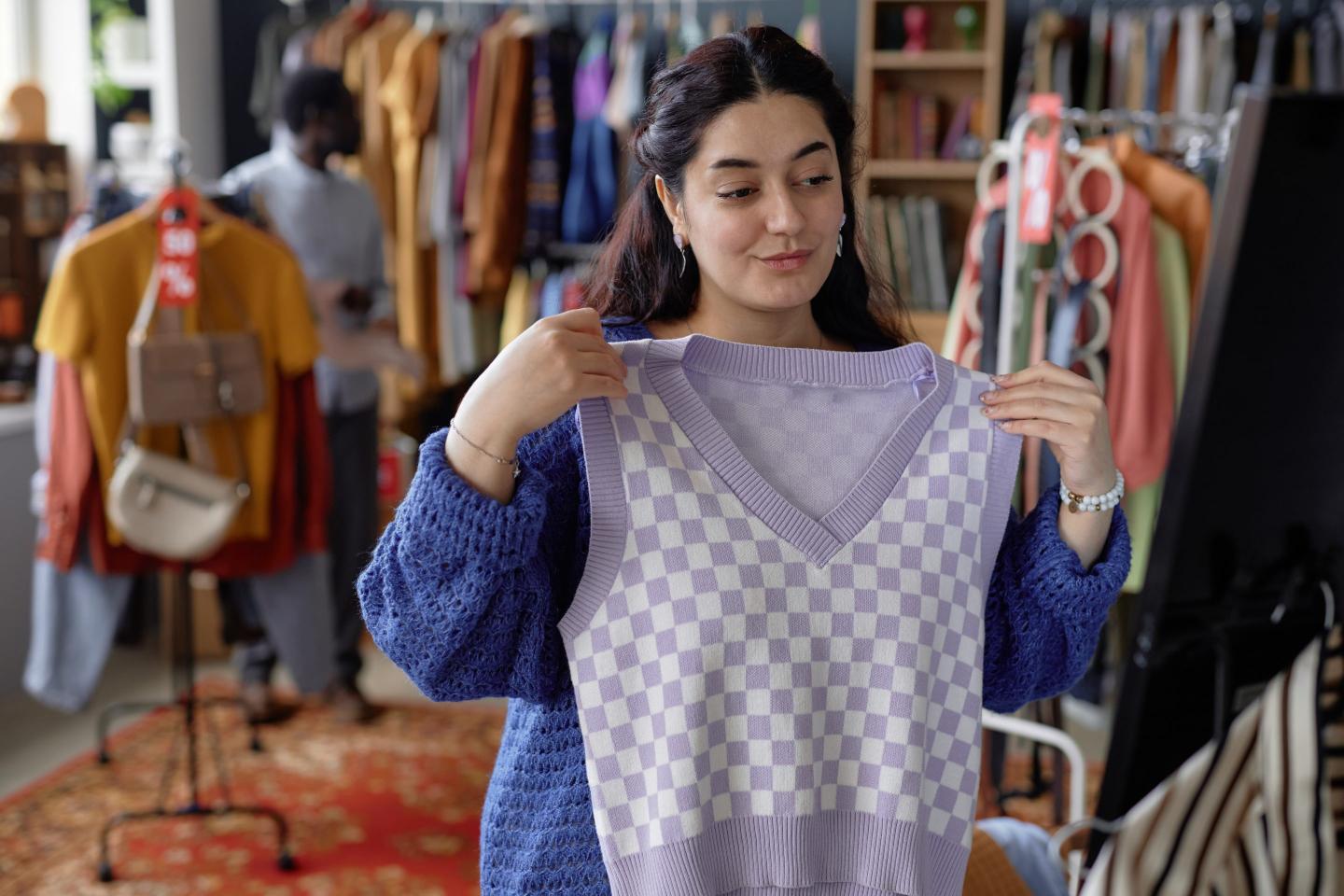 Americans are buying more used clothes, but the real story is who’s buying what: Luxury resale is booming and so is discount