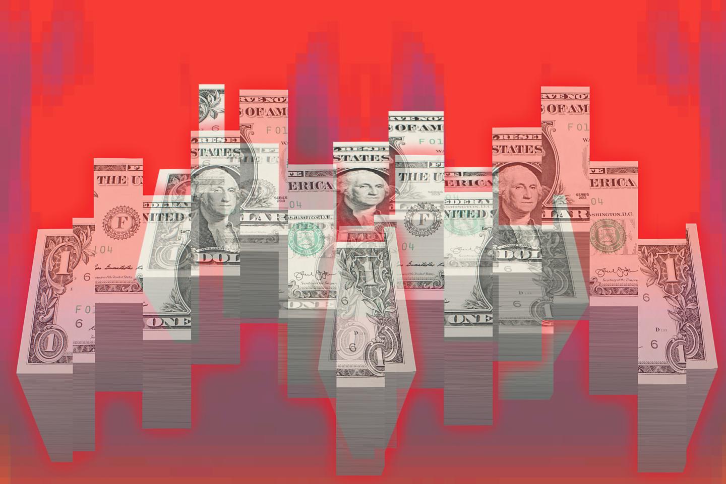 Piles of U.S. one-dollar bills split into sections of various height