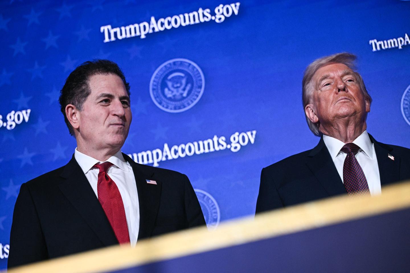 President Donald Trump with Dell CEO Michael Dell at an event on 'Trump Accounts' at the Andrew W. Mellon Auditorium in Washington, DC, on January 28, 2026.