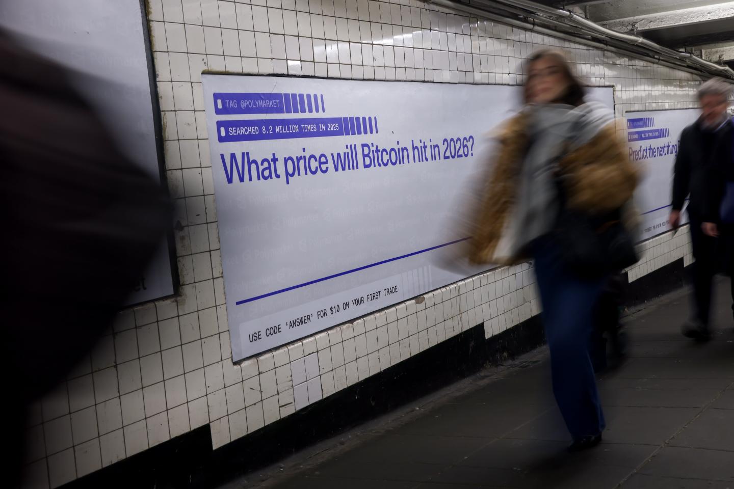 A Polymarket ad in a New York City subway station poses the question, "What price will Bitcoin hit in 2026?"