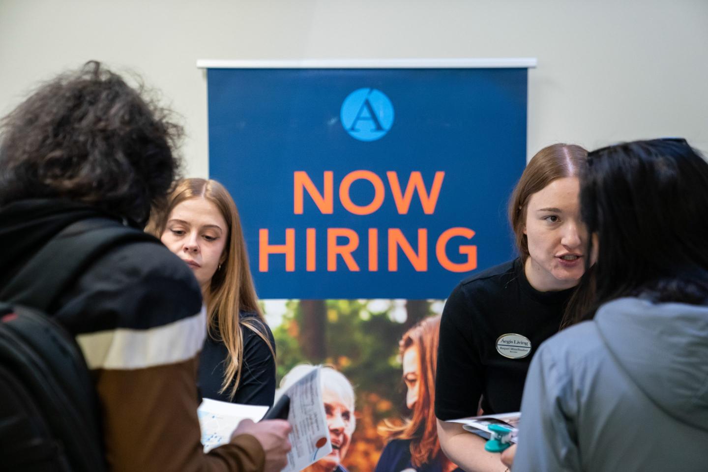 Recruiters talk with job seekers during the WorkSource North Seattle Career Fair, Feb. 10, 2026.