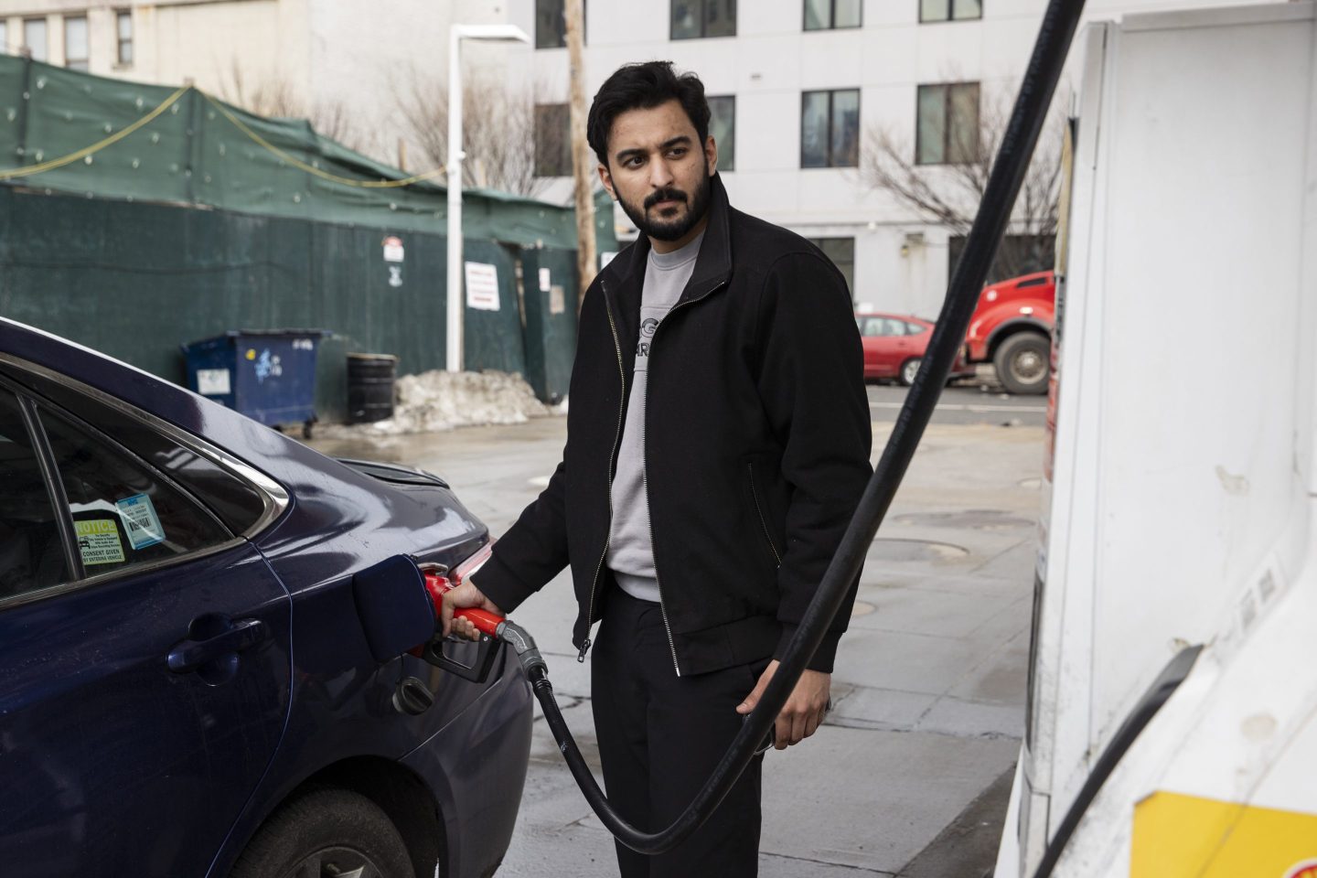 A driver pumps gasoline at a gas station in Brooklyn, New York, in March.