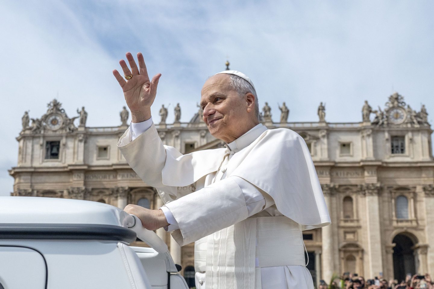 Pope Leo XIV waving to a crowd