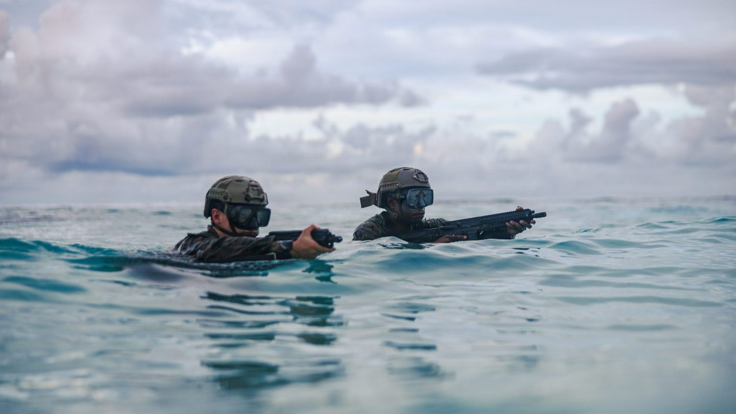 DIEGO GARCIA, BRITISH INDIAN OCEAN TERRITORIES - MARCH 24: (EDITOR'S NOTE: This Handout image was provided by a third-party organization and may not adhere to Getty Images' editorial policy.) United States Marines with Force Reconnaissance Platoon, 31st Marine Expeditionary Unit, conduct a simulated reconnaissance and surveillance mission as part of a simulated amphibious assault at a naval support facility on March 24, 2026 in Diego Garcia, British Indian Ocean Territories. The exercise comes as the U.S. continues military buildup in the Middle East, nearly a month after the US-Israeli joint offensive on Iran began. Overnight on March 20 Iran reportedly launched two intermediate-range ballistic missiles at Diego Garcia, neither of which struck their targets, but raised alarm over Iran's capability to launch attacks beyond its previously declared maximum missile range of 2,000 km. (Handout photo by Lance Cpl. Victor Gurrol/U.S. Marine Corps via Getty Images)