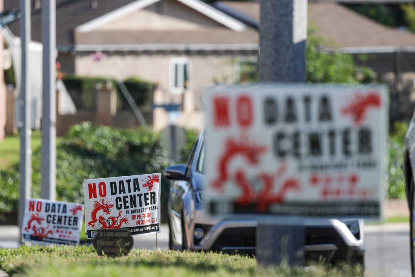 Signs opposing a proposed data center in Monterey Park, CA.