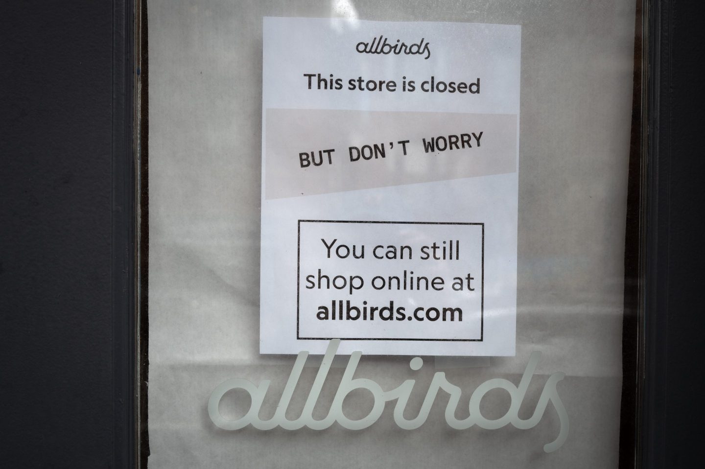 A sign hangs on the front door of a shuttered Allbirds store on April 02, 2026 in Chicago, Illinois.
