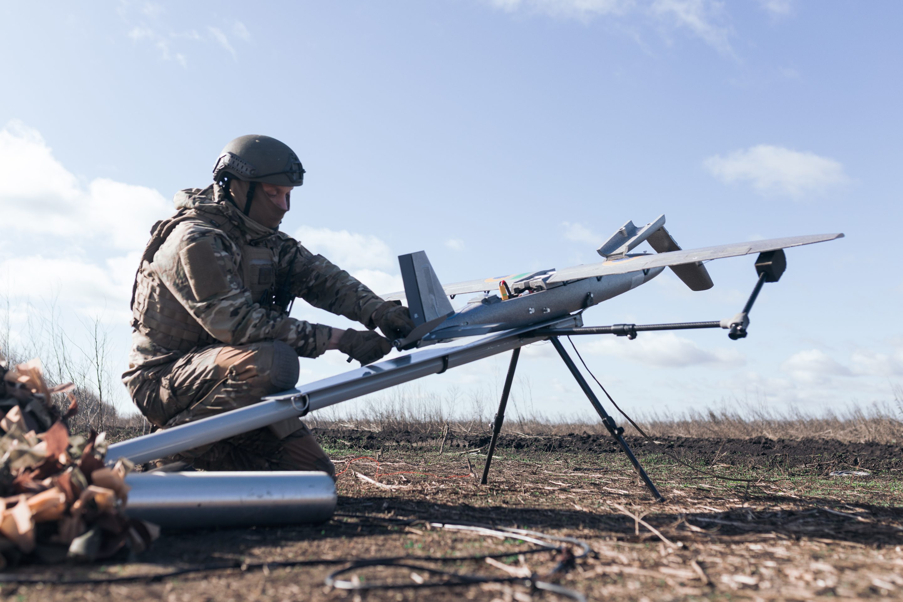 A Ukrainian soldier prepares a new strike drone, April 7, 2026, in Kharkiv region, Ukraine.