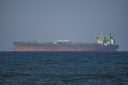 Three oil supertankers sail through the Strait of Hormuz